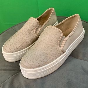 Croc print slip ons